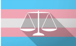transgender flag with a justice weight scale in the middle